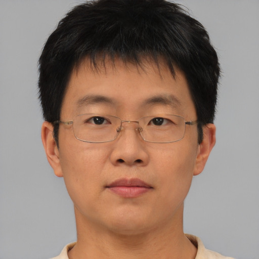 Neutral asian young-adult male with short  brown hair and brown eyes