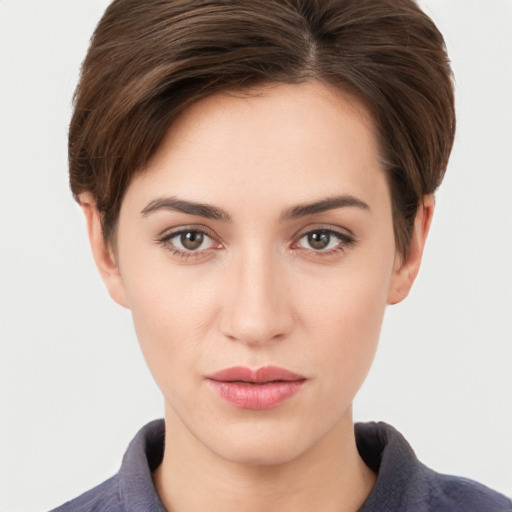 Neutral white young-adult female with short  brown hair and brown eyes