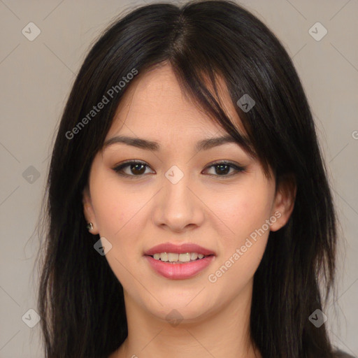 Joyful asian young-adult female with long  brown hair and brown eyes