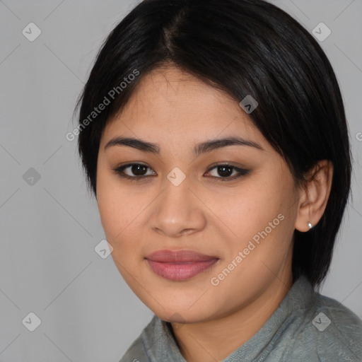 Joyful latino young-adult female with medium  black hair and brown eyes