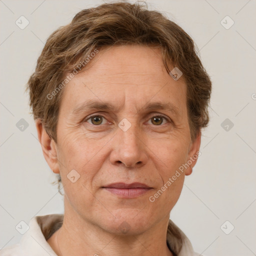 Joyful white adult male with short  brown hair and grey eyes