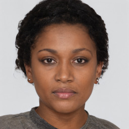 Neutral black young-adult female with short  brown hair and brown eyes