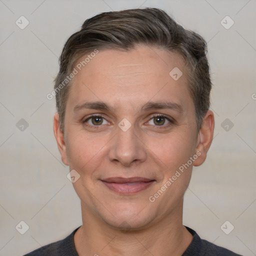 Joyful white adult female with short  brown hair and brown eyes