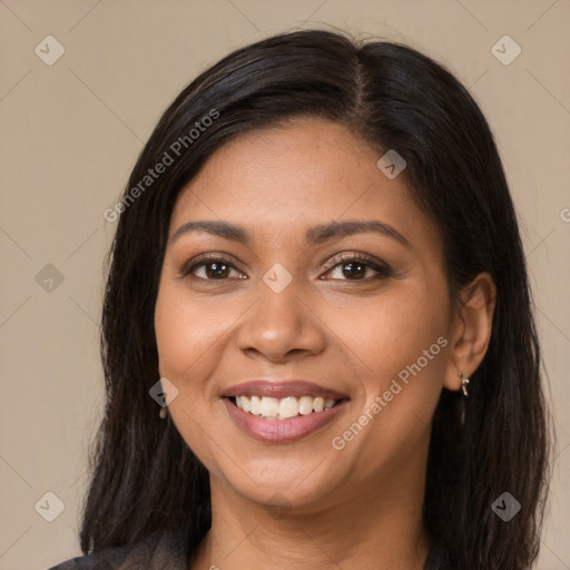 Joyful latino young-adult female with long  brown hair and brown eyes