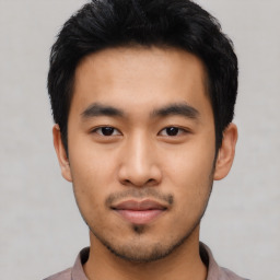 Neutral asian young-adult male with short  black hair and brown eyes