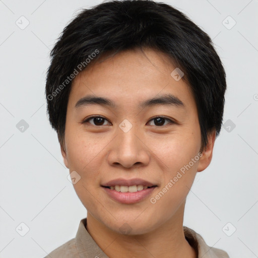 Joyful asian young-adult male with short  brown hair and brown eyes