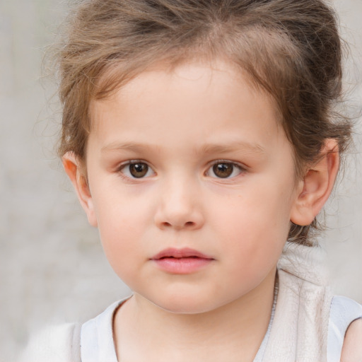 Neutral white child female with short  brown hair and brown eyes