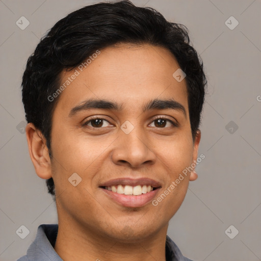 Joyful latino young-adult male with short  brown hair and brown eyes