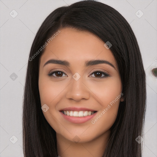 Joyful latino young-adult female with long  black hair and brown eyes