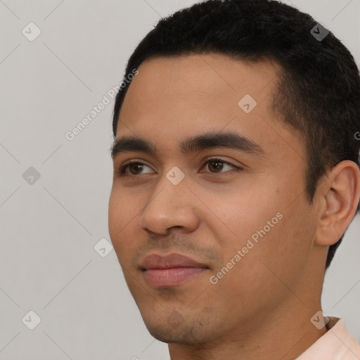 Neutral latino young-adult male with short  black hair and brown eyes