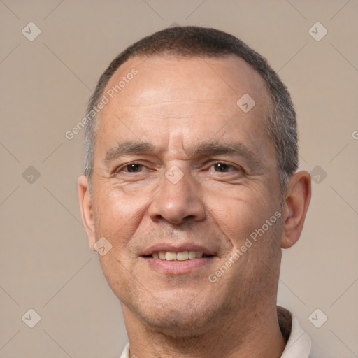 Joyful white adult male with short  brown hair and brown eyes