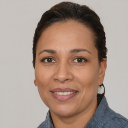 Joyful white adult female with short  brown hair and brown eyes