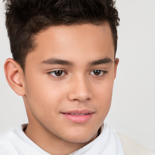 Joyful white child male with short  brown hair and brown eyes