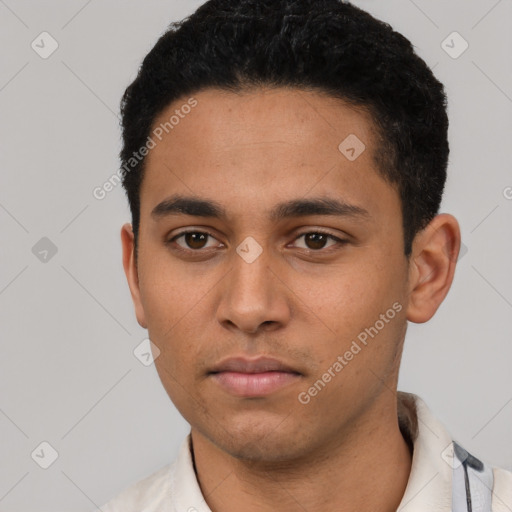 Neutral latino young-adult male with short  black hair and brown eyes