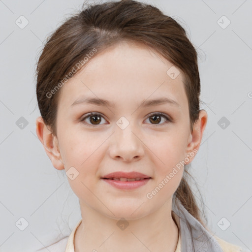 Joyful white child female with short  brown hair and brown eyes