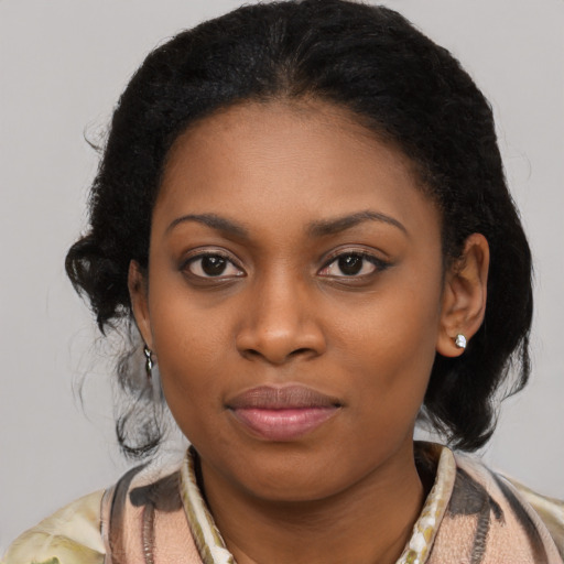 Joyful latino young-adult female with medium  black hair and brown eyes