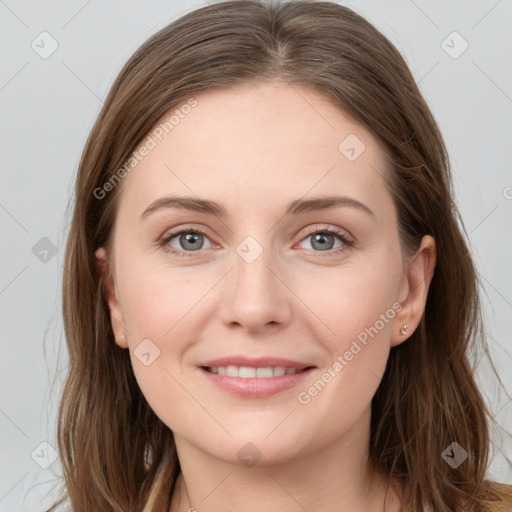 Joyful white young-adult female with long  brown hair and grey eyes