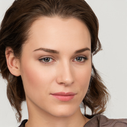 Neutral white young-adult female with medium  brown hair and brown eyes