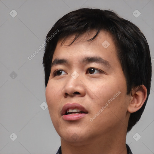 Neutral asian young-adult male with short  black hair and brown eyes