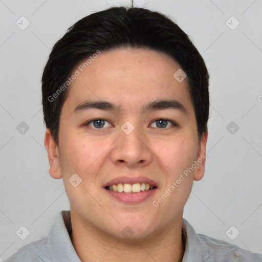 Joyful asian young-adult male with short  black hair and brown eyes