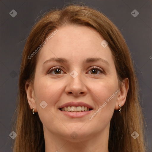 Joyful white adult female with long  brown hair and brown eyes