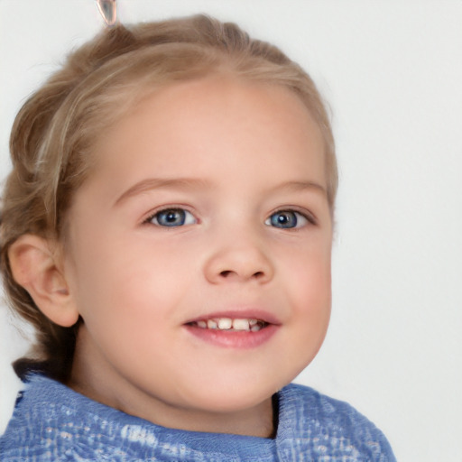 Joyful white child female with short  brown hair and blue eyes