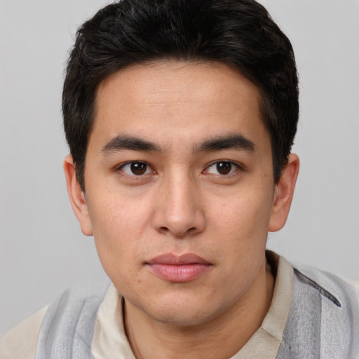 Neutral asian young-adult male with short  brown hair and brown eyes