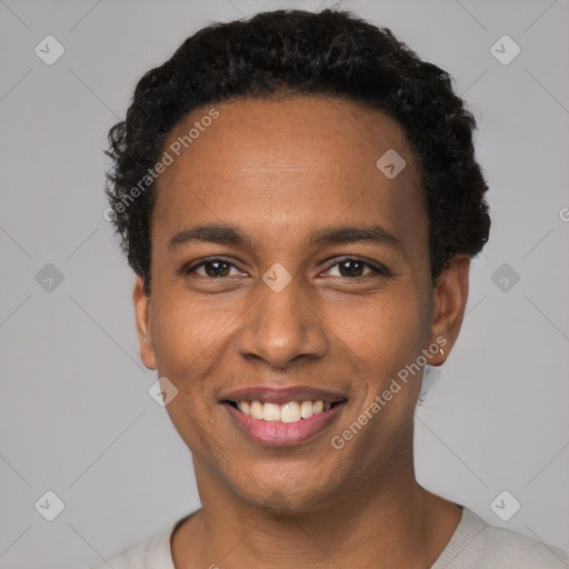 Joyful black young-adult male with short  black hair and brown eyes