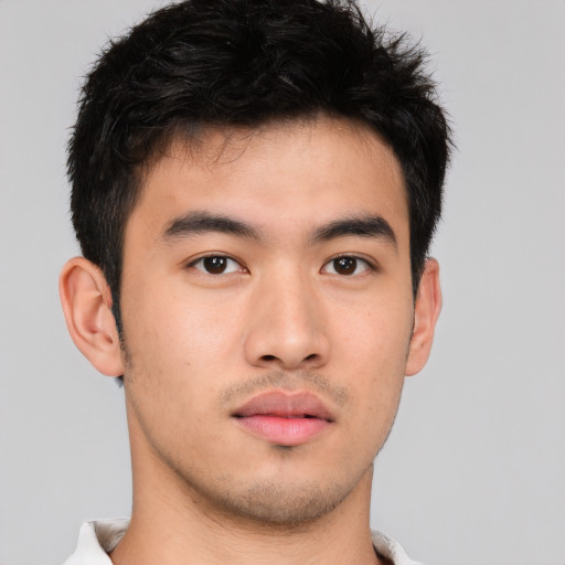 Neutral asian young-adult male with short  brown hair and brown eyes