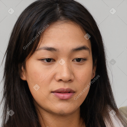 Joyful asian young-adult female with long  brown hair and brown eyes