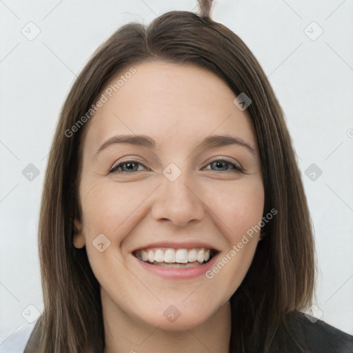 Joyful white young-adult female with long  brown hair and grey eyes