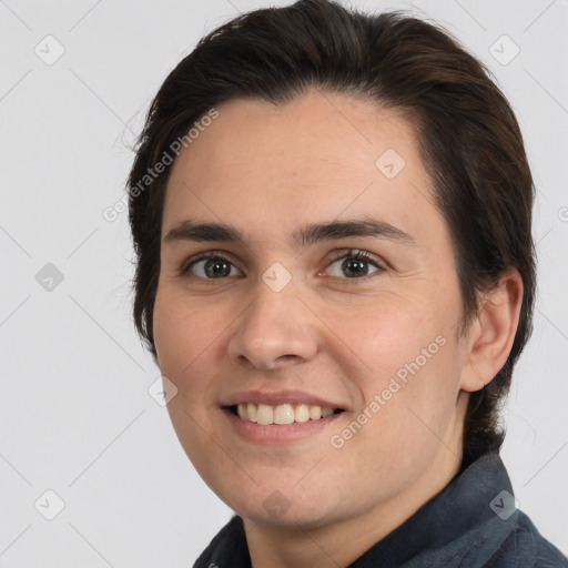 Joyful white young-adult male with medium  brown hair and brown eyes