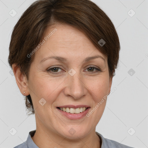 Joyful white adult female with short  brown hair and brown eyes