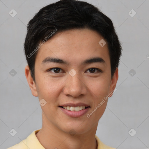 Joyful asian young-adult male with short  brown hair and brown eyes