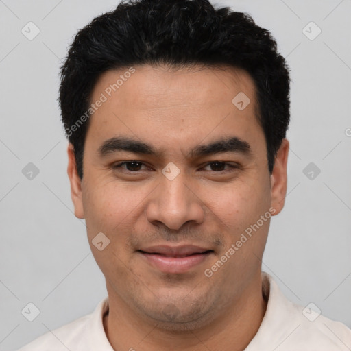 Joyful latino young-adult male with short  black hair and brown eyes