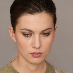 Neutral white young-adult female with short  brown hair and brown eyes