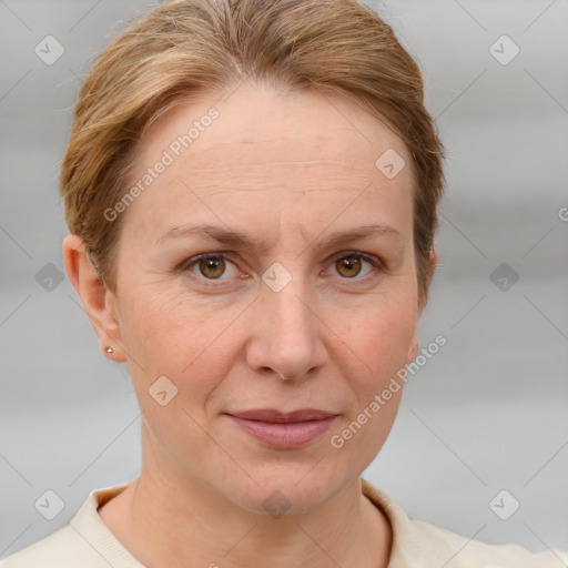 Joyful white adult female with short  brown hair and brown eyes