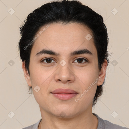 Joyful latino young-adult female with medium  brown hair and brown eyes