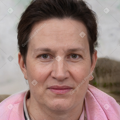 Joyful white adult female with short  brown hair and brown eyes