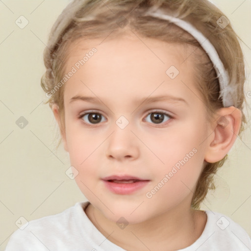 Joyful white child female with short  brown hair and brown eyes