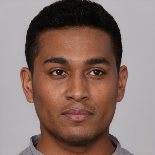 Neutral black young-adult male with short  brown hair and brown eyes