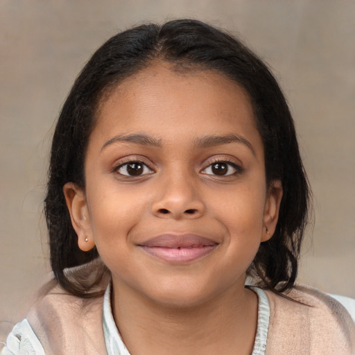 Joyful black child female with medium  brown hair and brown eyes