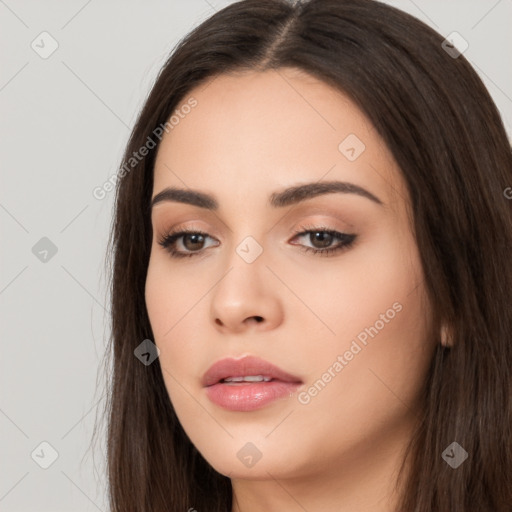 Neutral white young-adult female with long  brown hair and brown eyes