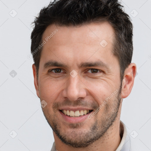 Joyful white young-adult male with short  brown hair and brown eyes