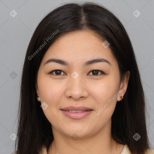 Joyful asian young-adult female with long  brown hair and brown eyes