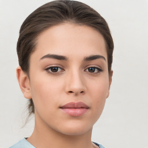 Neutral white young-adult female with medium  brown hair and brown eyes