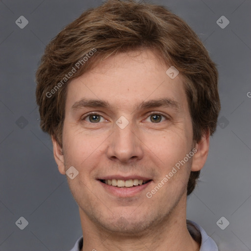 Joyful white adult male with short  brown hair and grey eyes