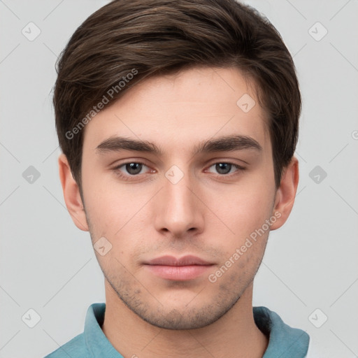 Neutral white young-adult male with short  brown hair and brown eyes