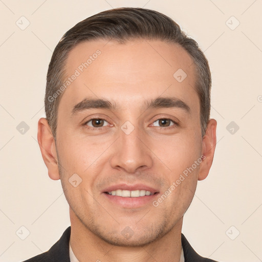 Joyful white young-adult male with short  brown hair and brown eyes