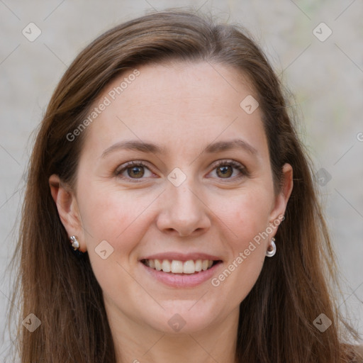 Joyful white adult female with long  brown hair and grey eyes